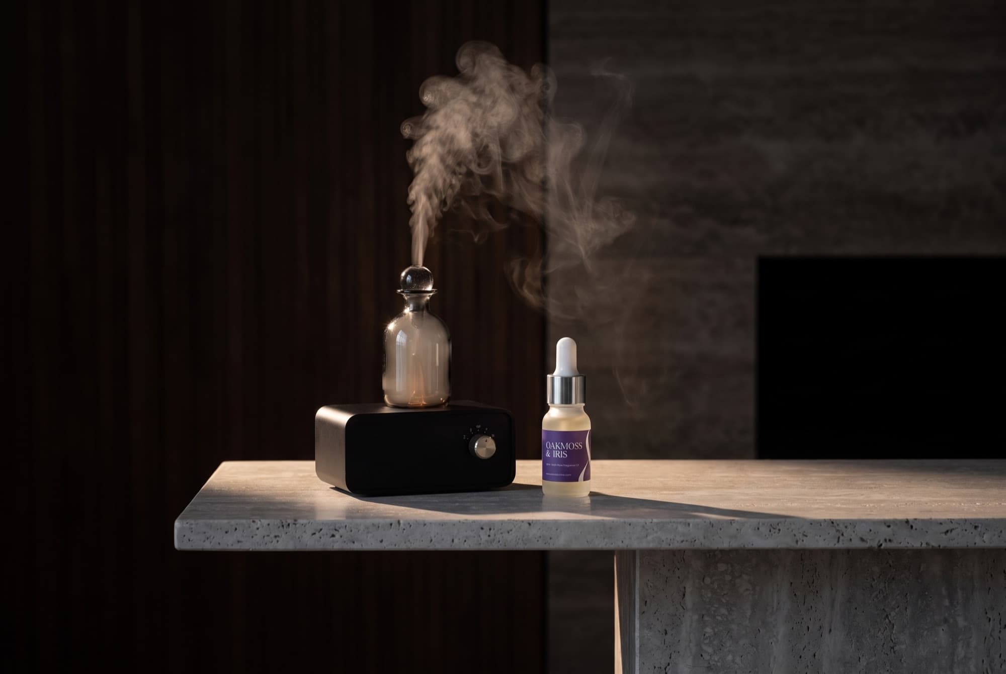 The Still with a Muir and Me pure oil blend on a stone console