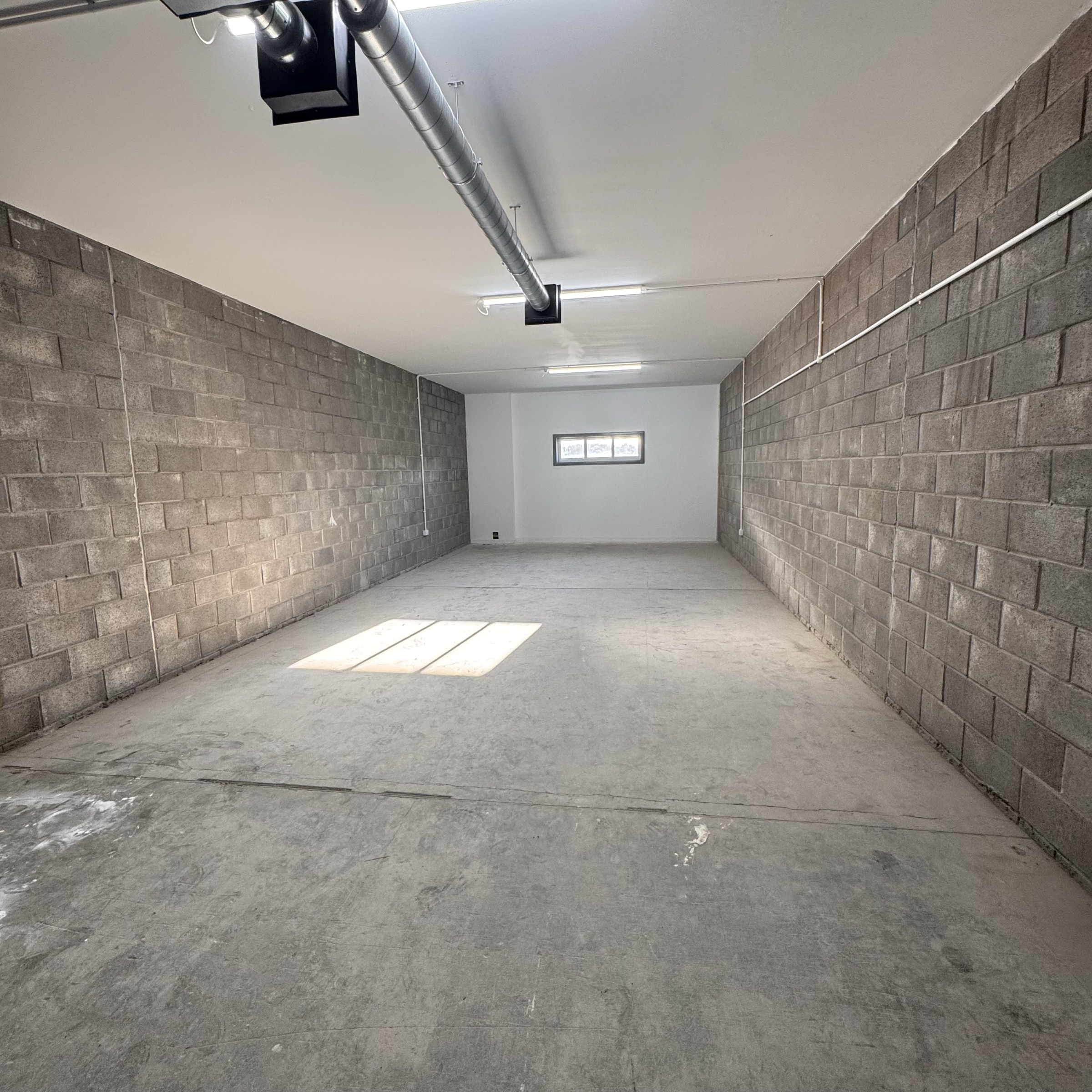 The empty Glasgow unit before Muir & Me fitted it out by hand